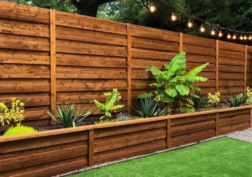 How A Wooden Privacy Fence Enhances Your Friendswood Residential Landscaping